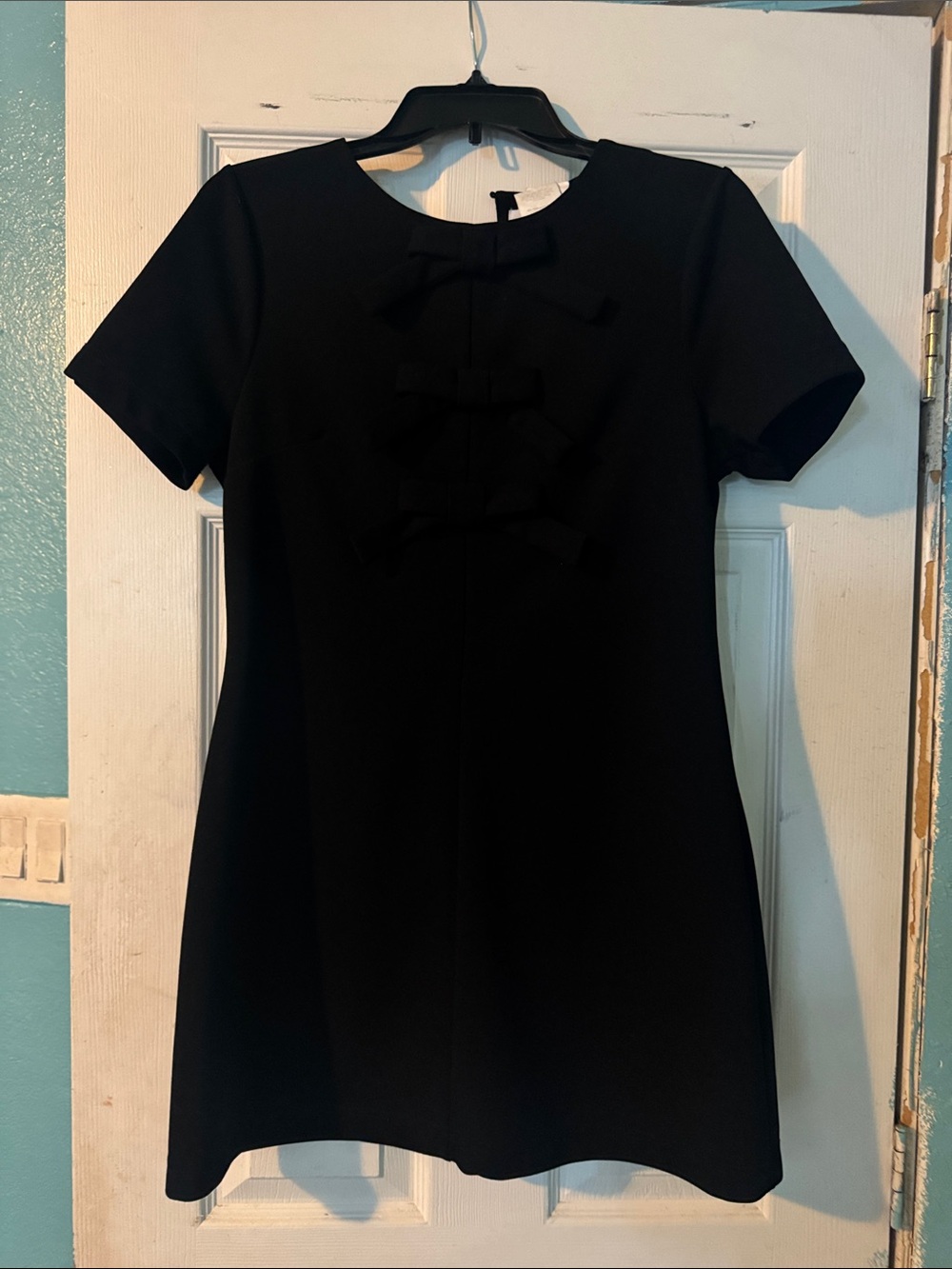 Elegant Black Mini Dress with Front Bow Accents